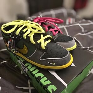 Nike Black and Yellow Sneakers with Bold Accents